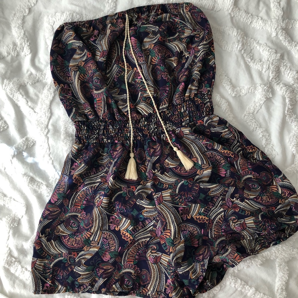 Cute detailed Romper.